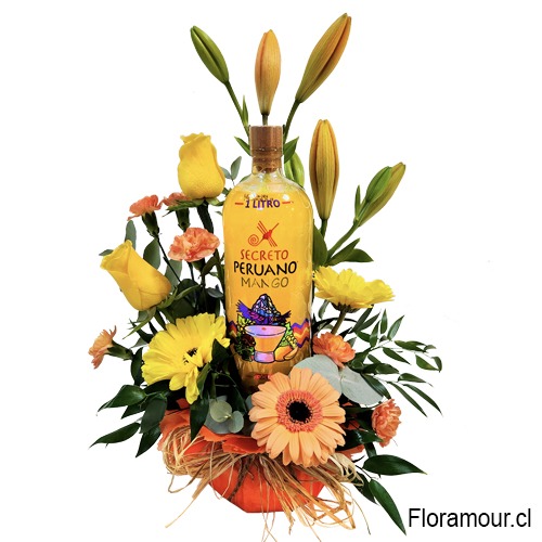 Arreglo Floral en base humectada confeccionado con rosas liliums gerberas y claveles con Botella de pisco sour Mango especial para el día del padre